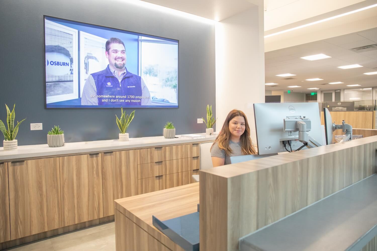 Osburn Contractors Skykit Beam Digital Signage Solution Corporate Comms at Welcome Desk