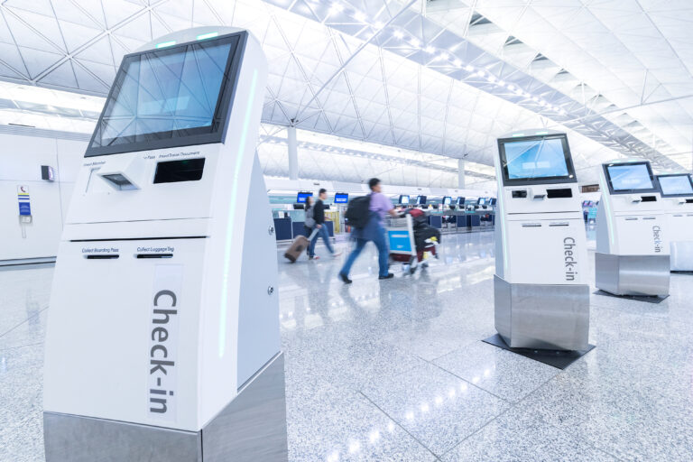 Self service machine and help desk kiosk at airport for check in, printing boarding pass or buying ticket kiosk software
